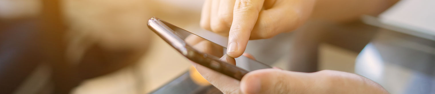 Person working on mobile phone